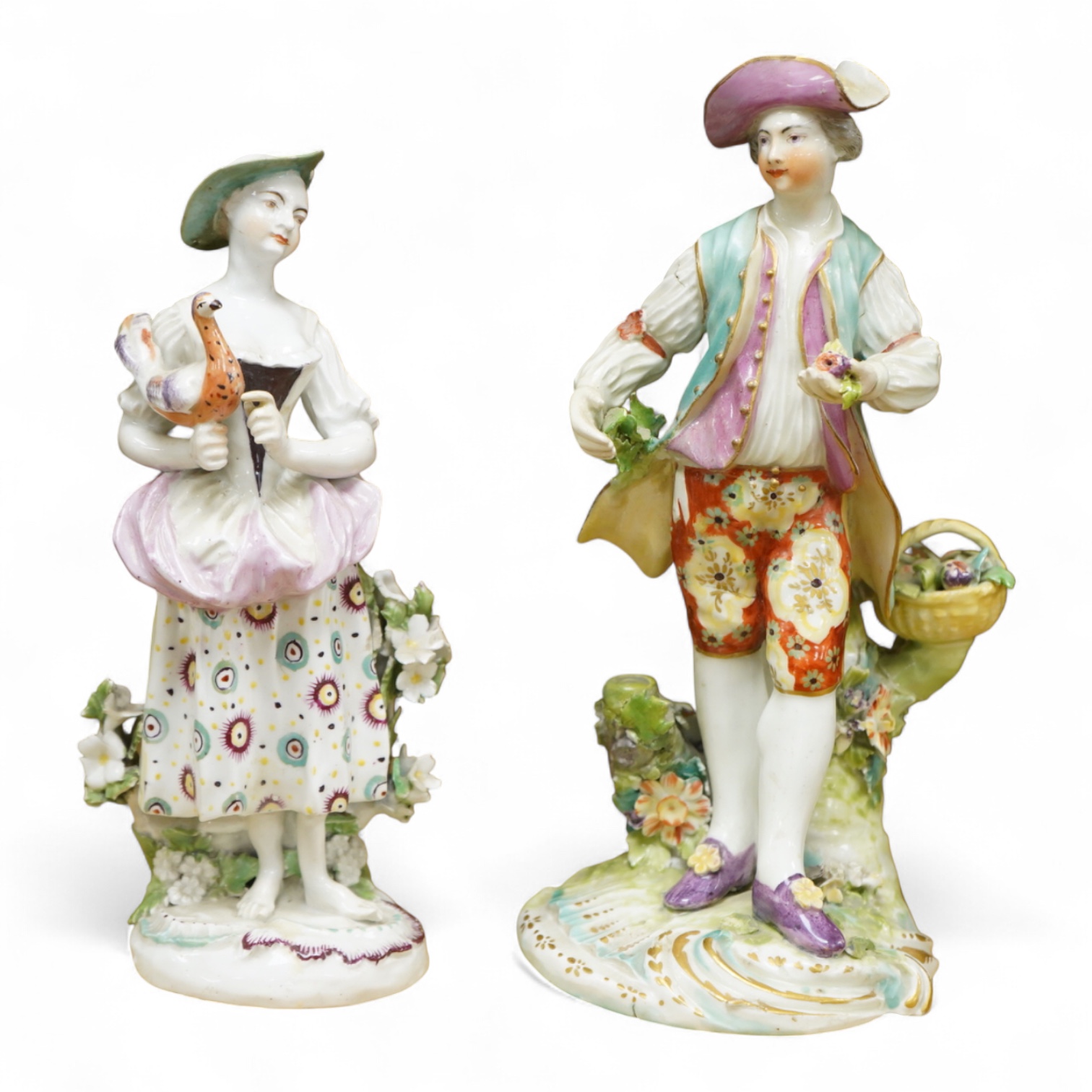 A Derby porcelain figure of a lady holding a bird, c.1760-65 and a Derby porcelain figure of a gentleman fruit seller, largest 24cm high (2)